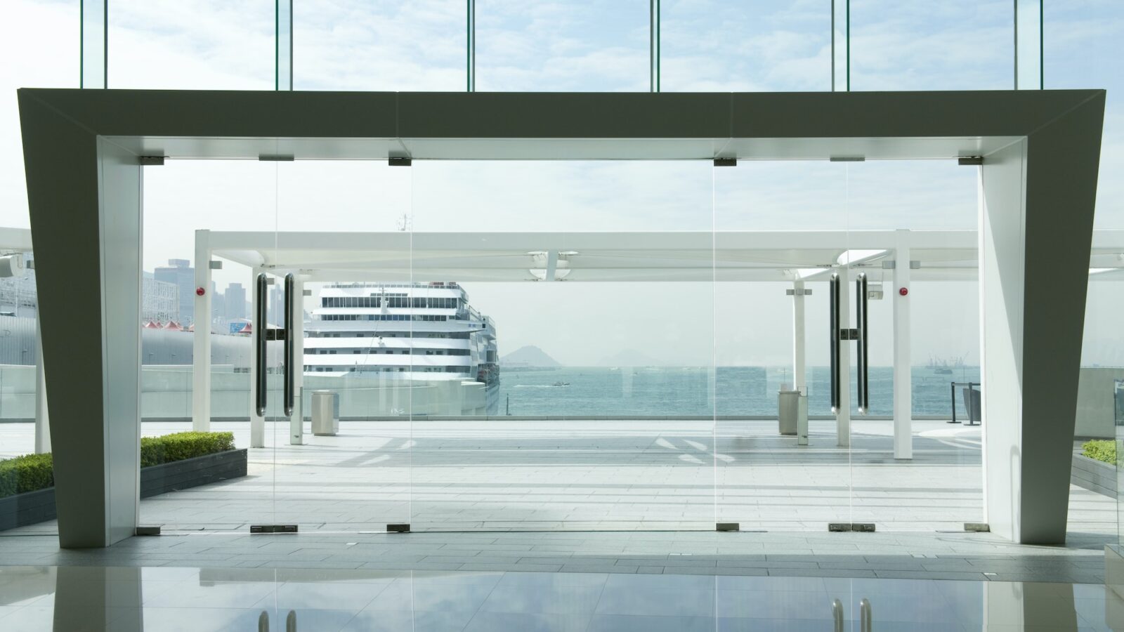 View of cruise shi from inside cruise terminal building.